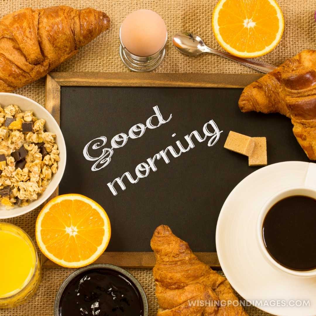 Coffee with a croissant and orange. Good Morning Coffee Images